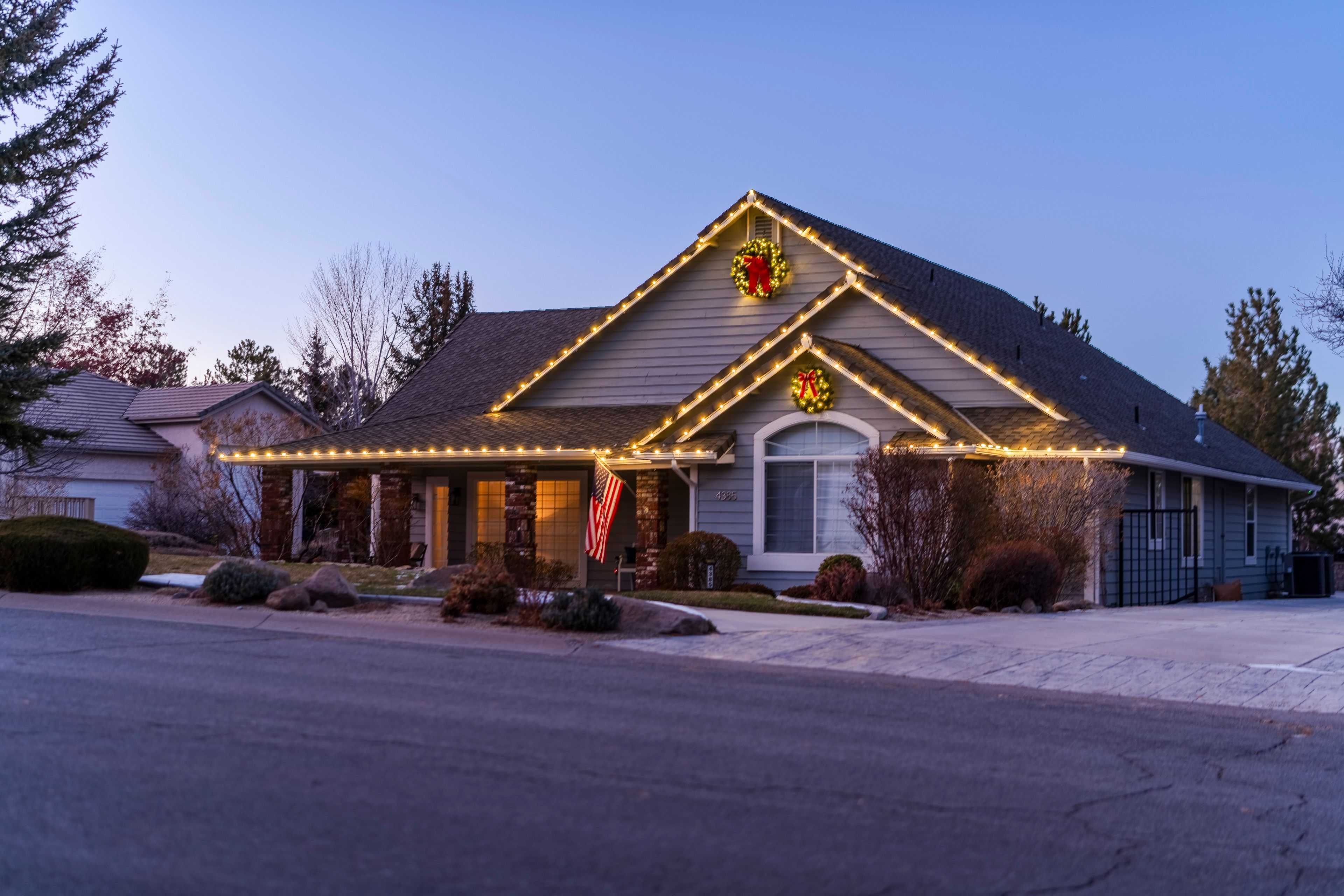 Reno home with Christmas lights on the roof
