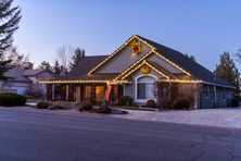 Reno home with Christmas lights on the roof