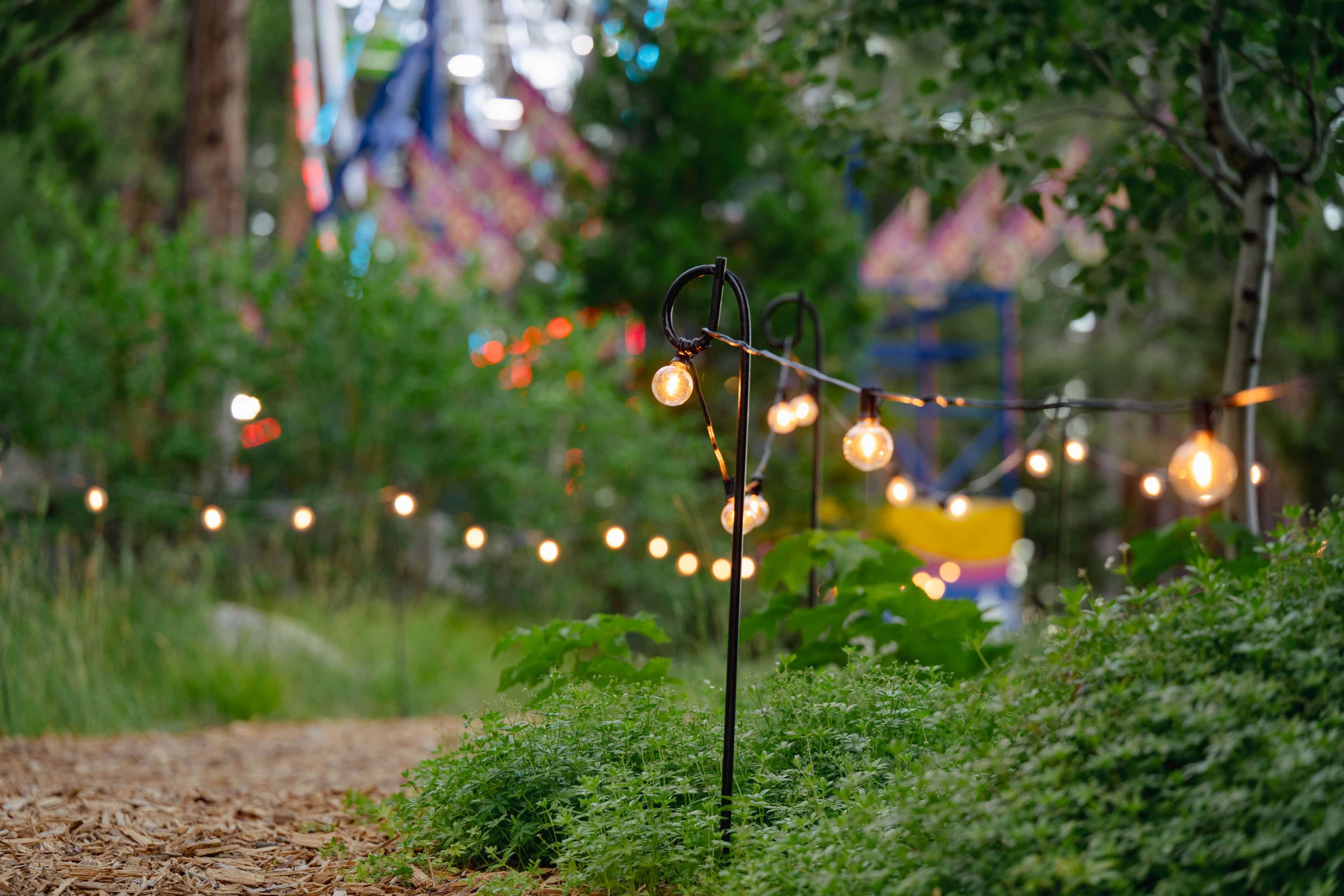 market lights hung on curlicue hooks