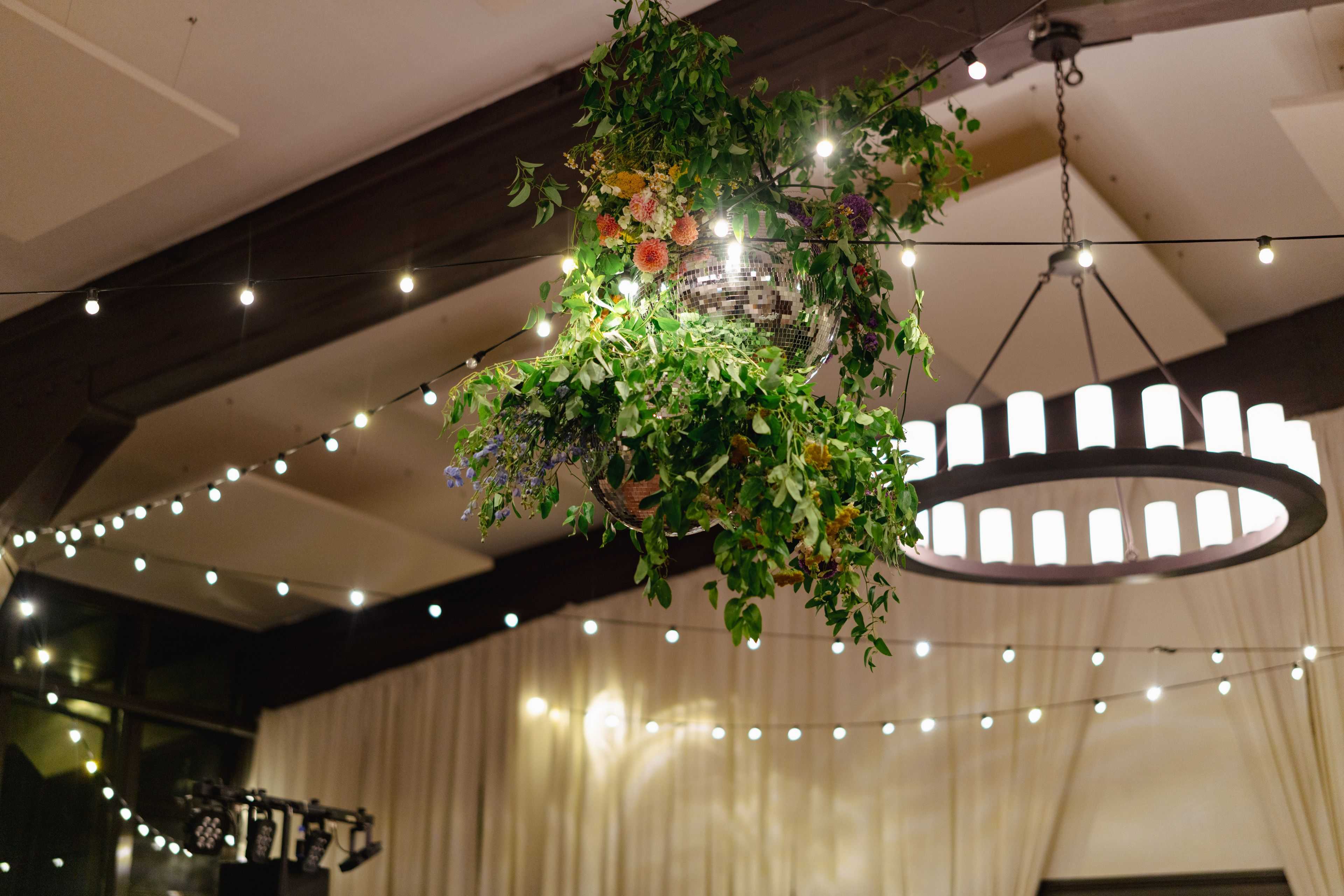 disco ball chandelier hanging in the rafters of Olympic Valley Events Center