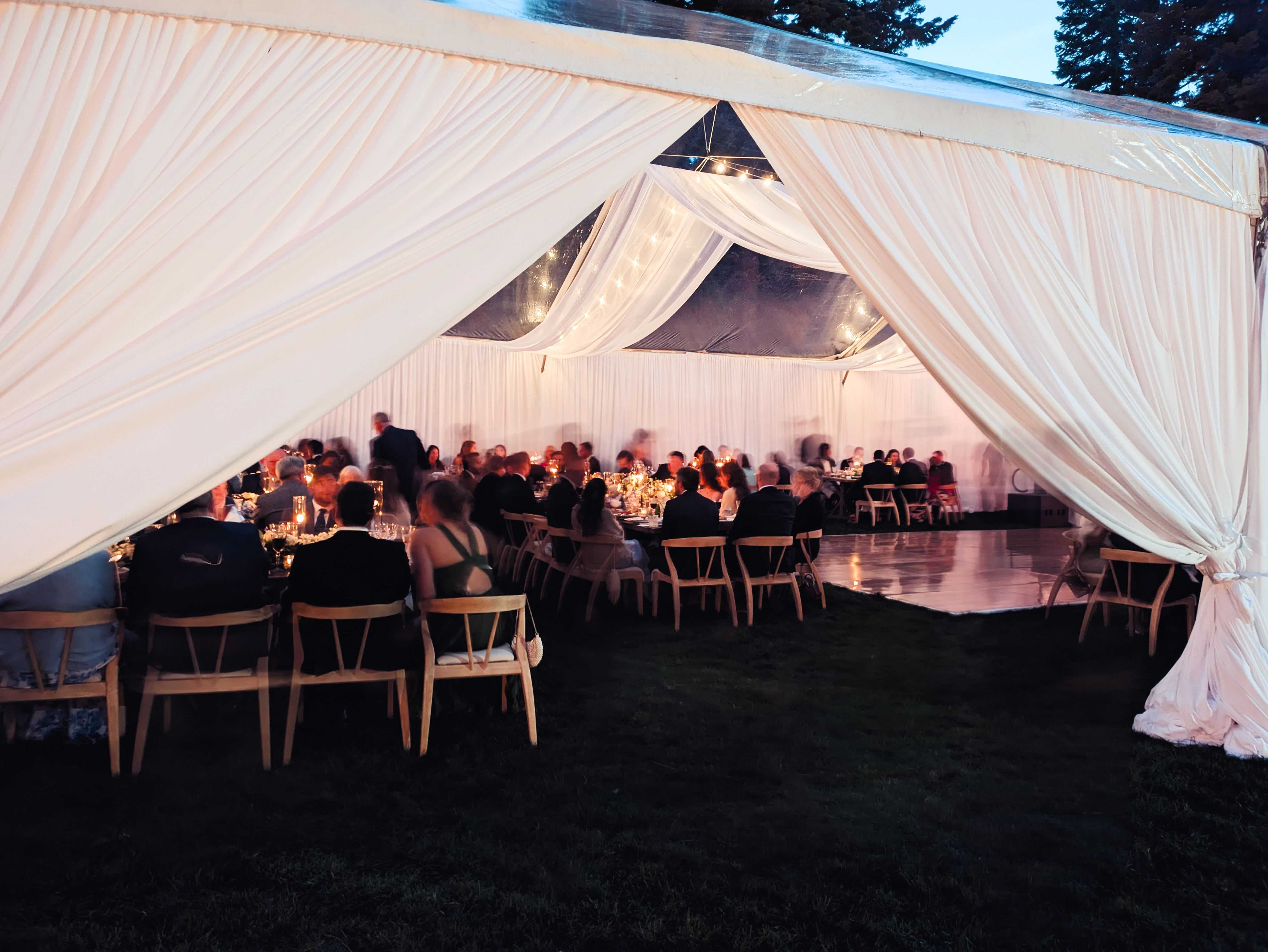 wedding tent wrapped in white drapery