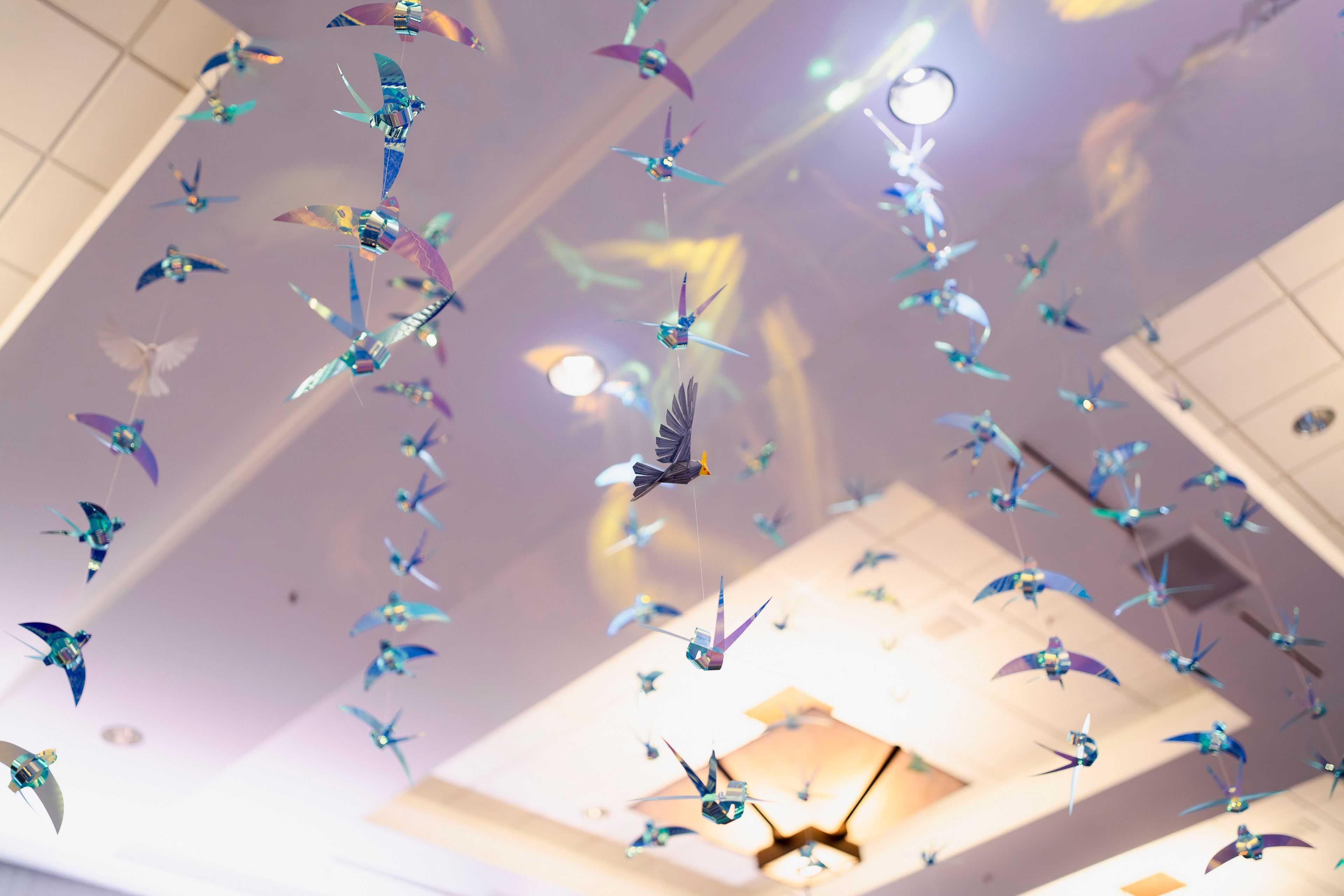 detail image of bids hanging in a ballroom