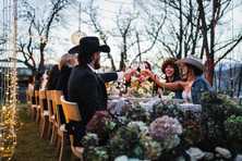 wedding couple inside a mini light tunnel