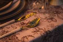 creative coverings wedding linens with cutlery reflecting lighting