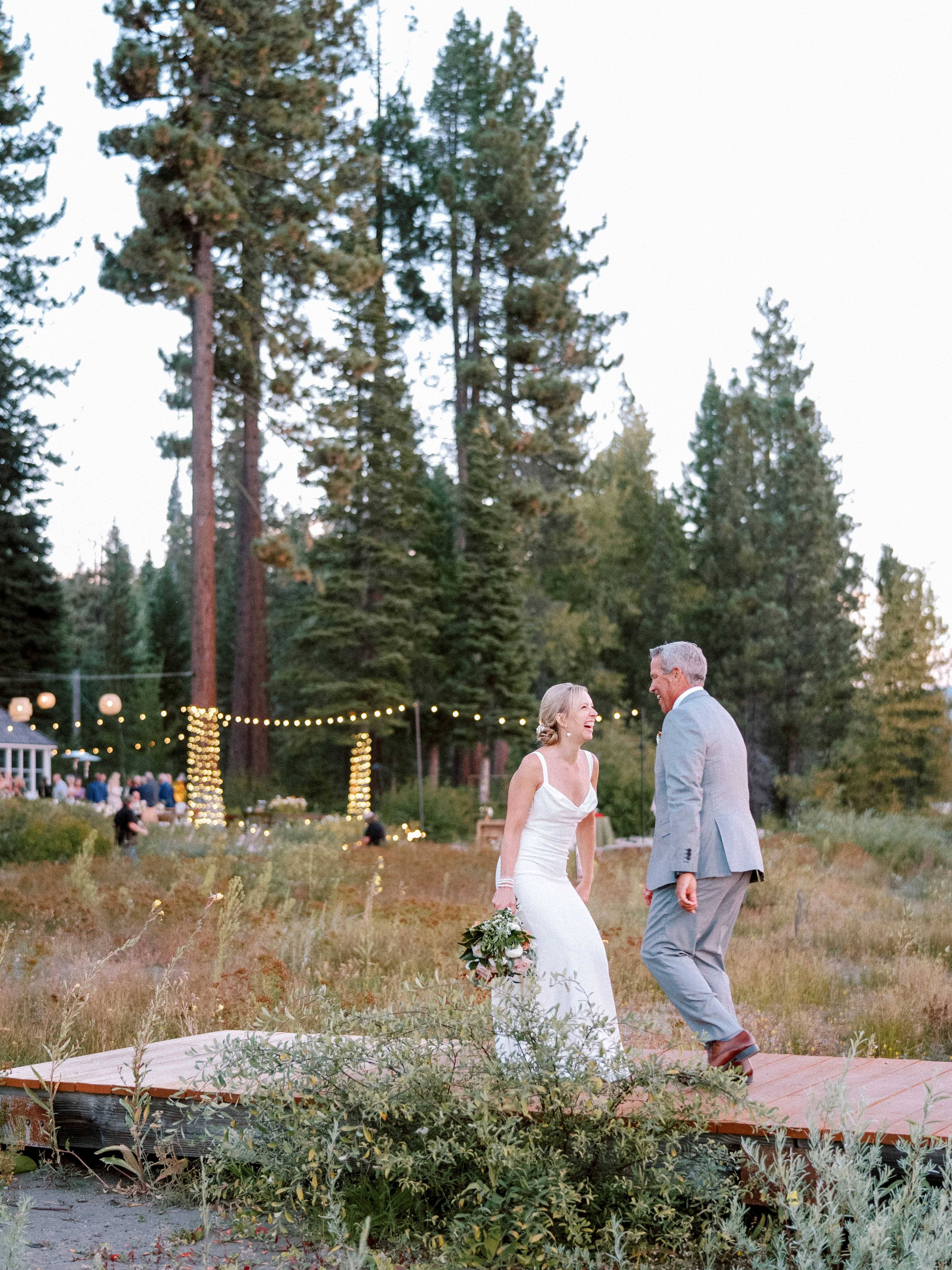 a wedding couple with Sierra lighting lights behind