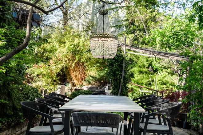 a crystal chandelier hanging over a table