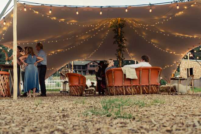 fairy lights lighting up a wedding tent