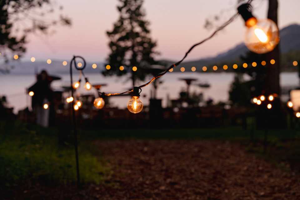 market lights lining a path above Lake Tahoe