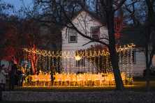 the venue at meadow view with a wedding table in front of the farm house