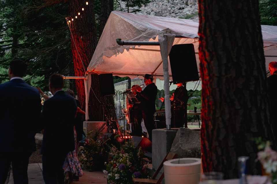 uplighting enhancing the trees surrounding a band playing at white wolf tahoe