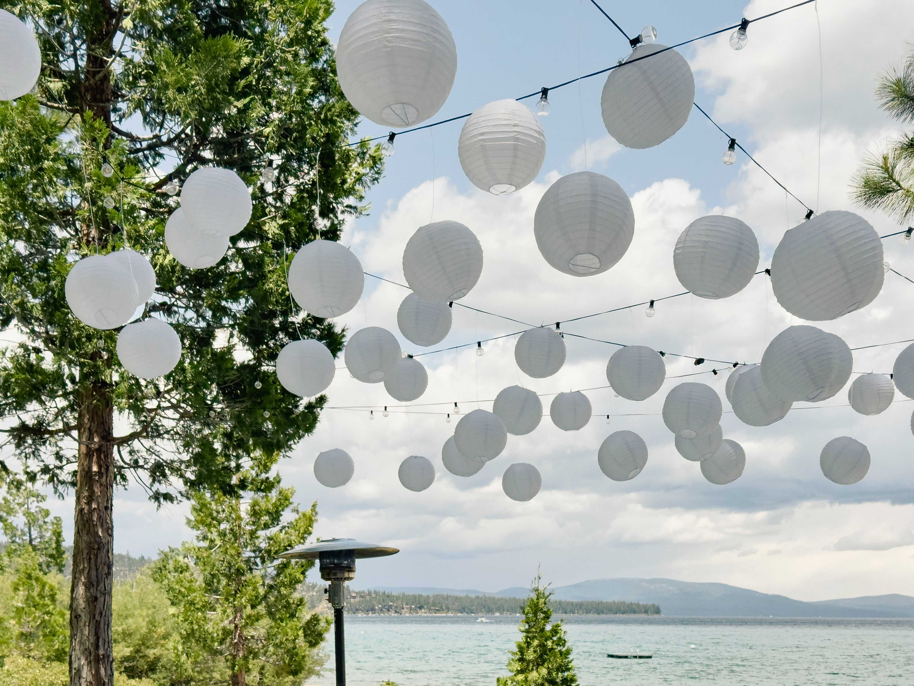 paper lantern clouds with market lights over Lake Tahoe