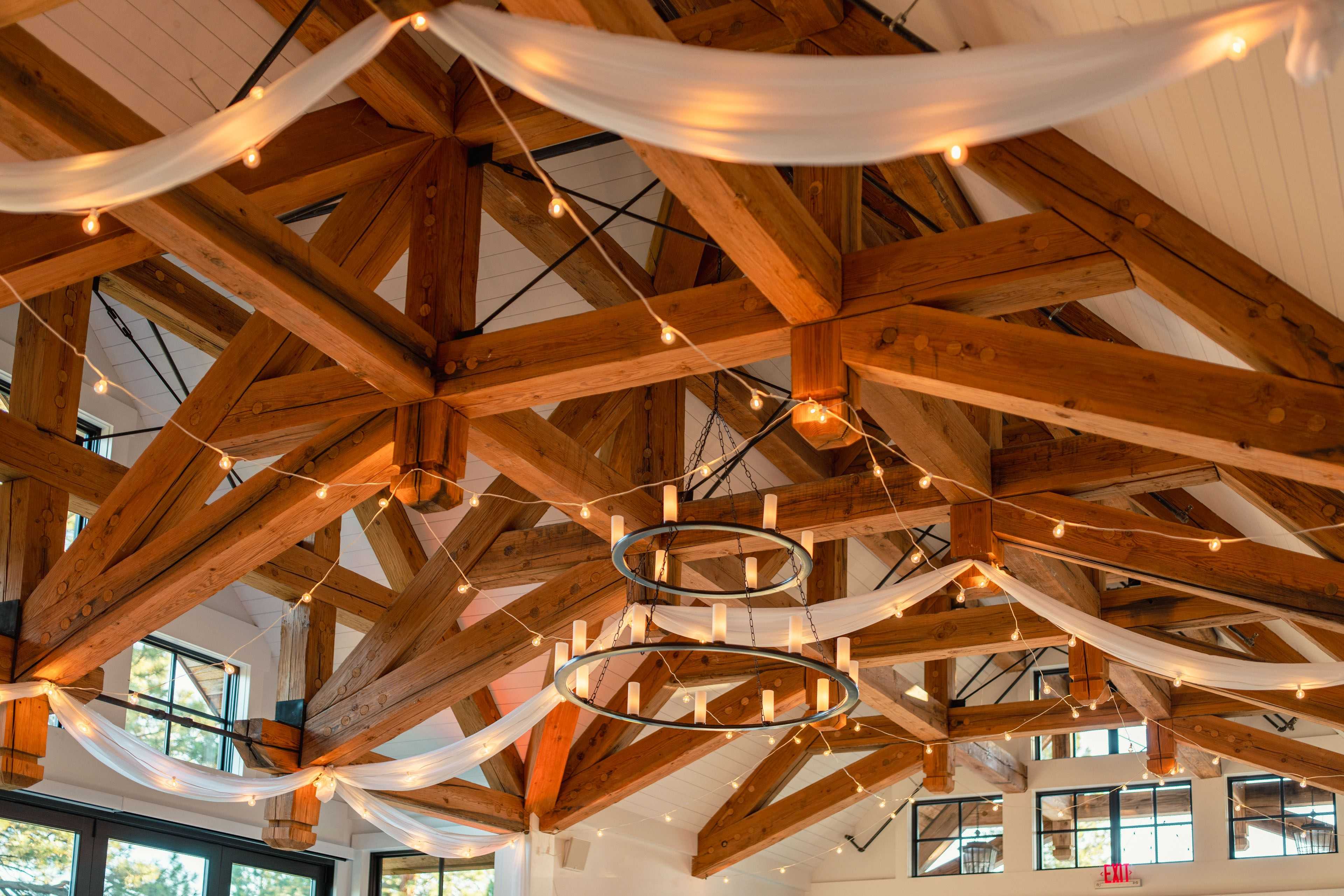 wedding drapery hanging in the rafters of the timbers at old Greenwood