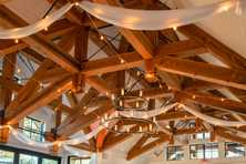wedding drapery hanging in the rafters of the timbers at old Greenwood