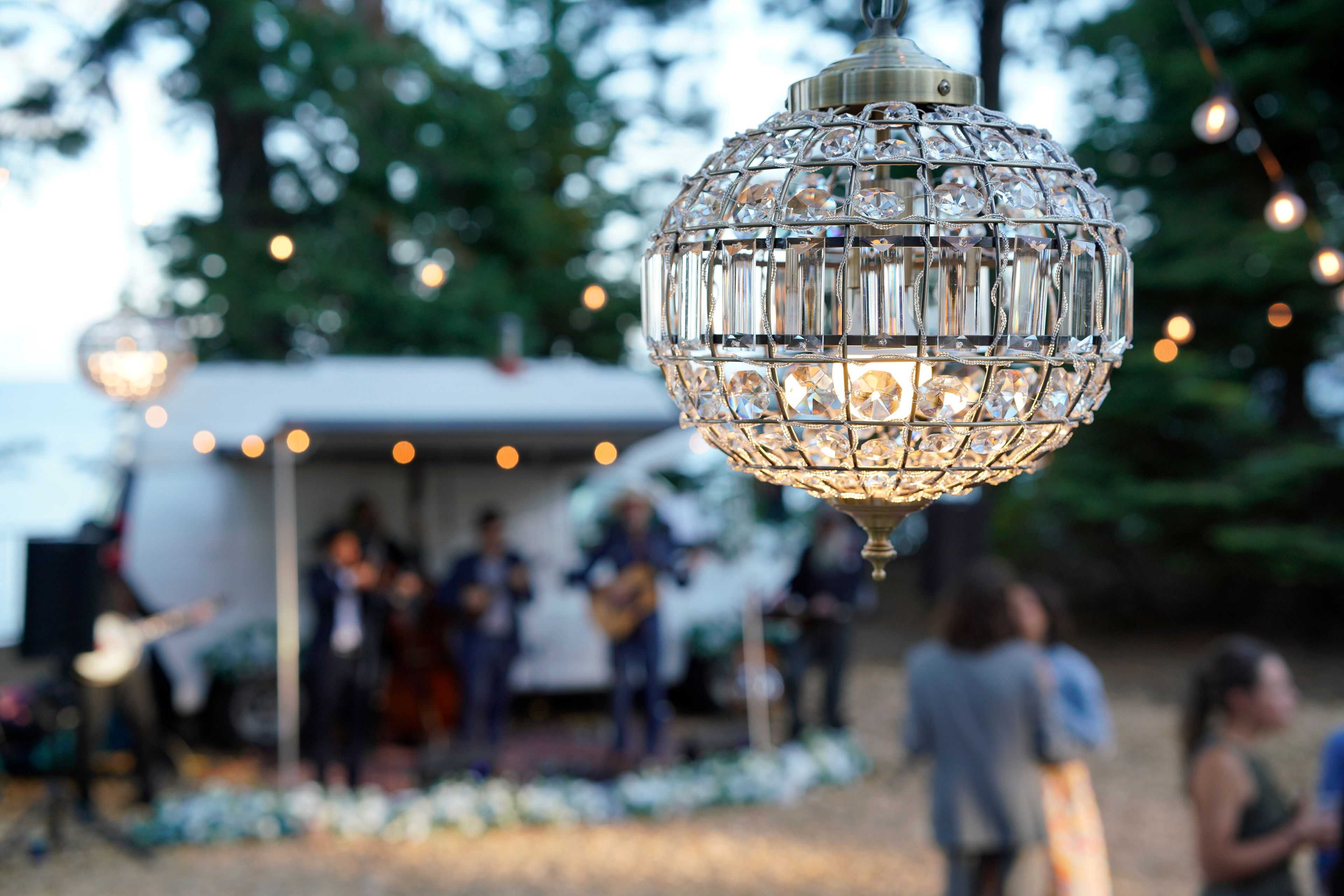 crystal chandelier above a wedding